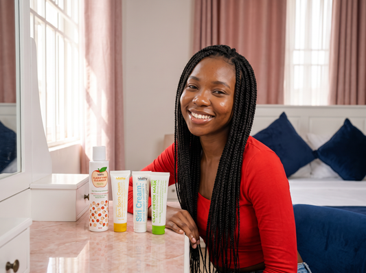 Young woman at her dressing table with the four Starter Kit products (illustrative image)